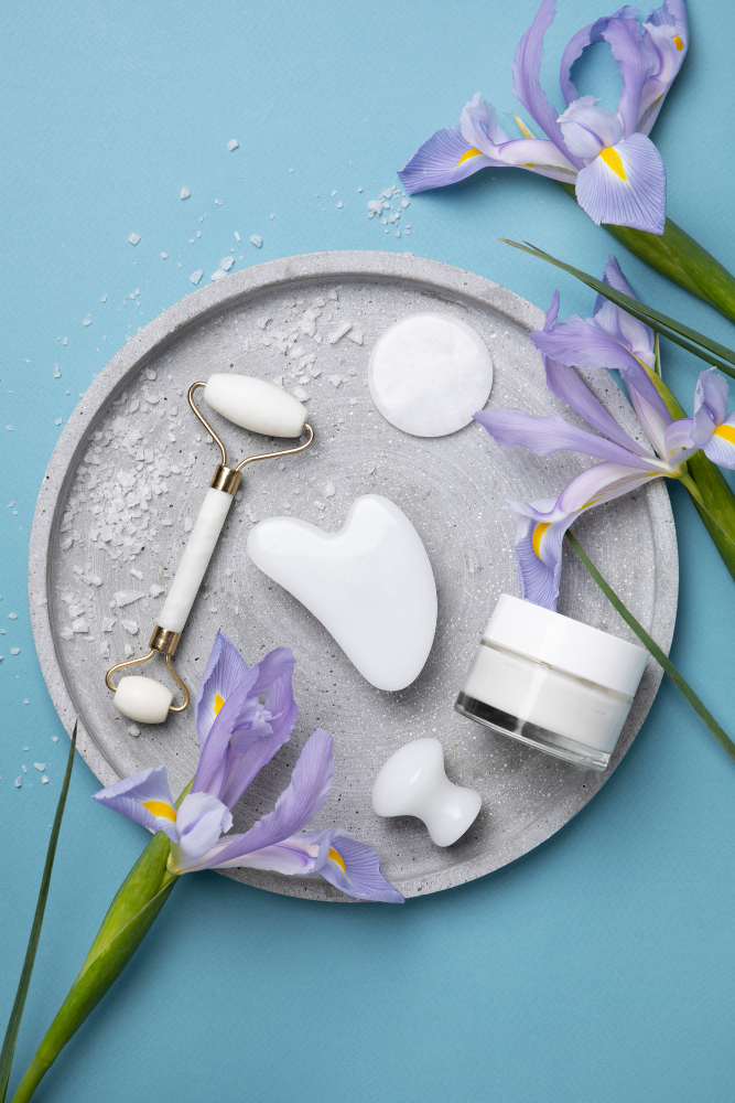 top-view-gua-sha-flowers-arrangement